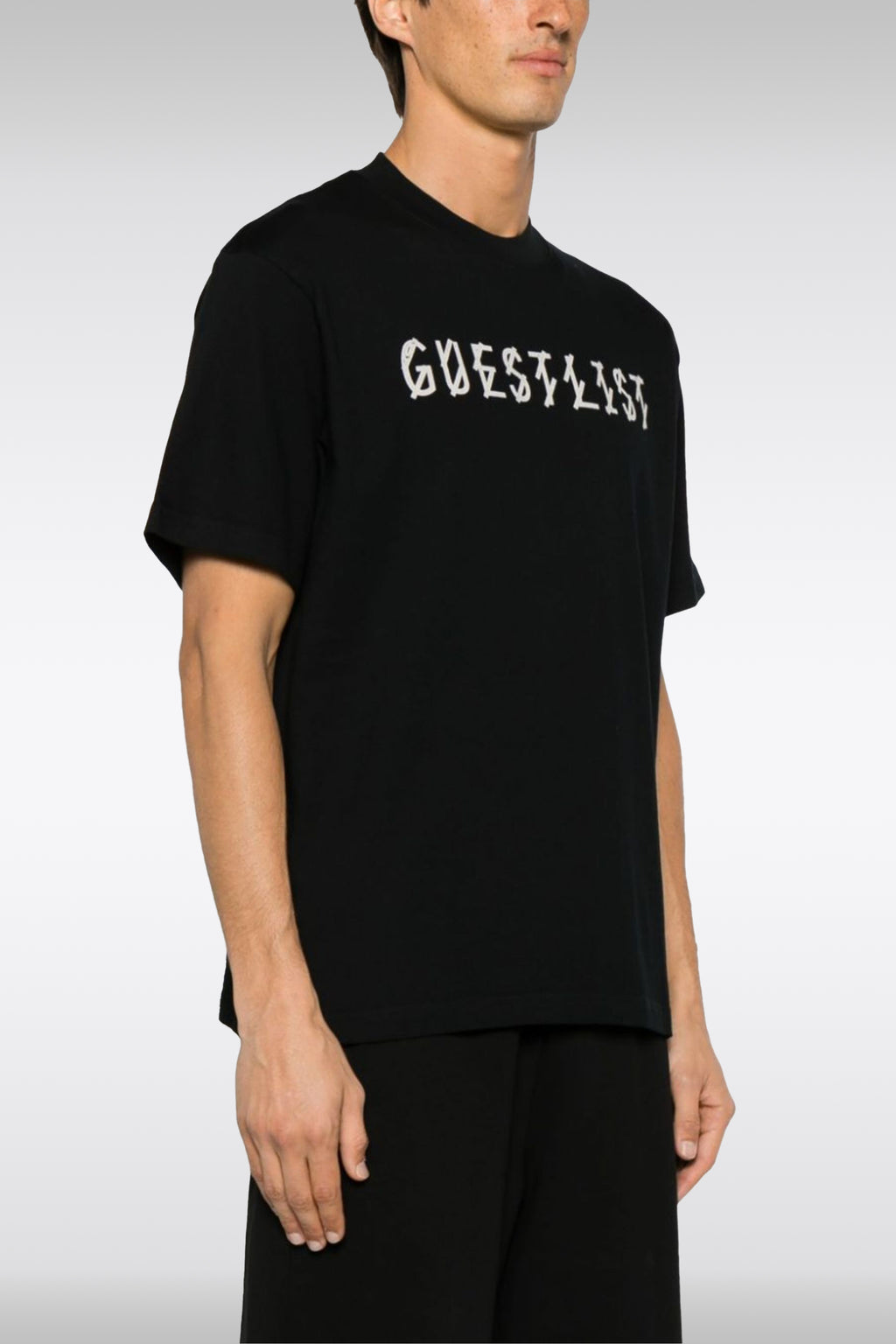 alt-image__Black-cotton-t-shirt-with-front-slogan-and-back-logo---Gyuestlist-Tee