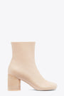 Beige leather ankle boots with anatomic toe 