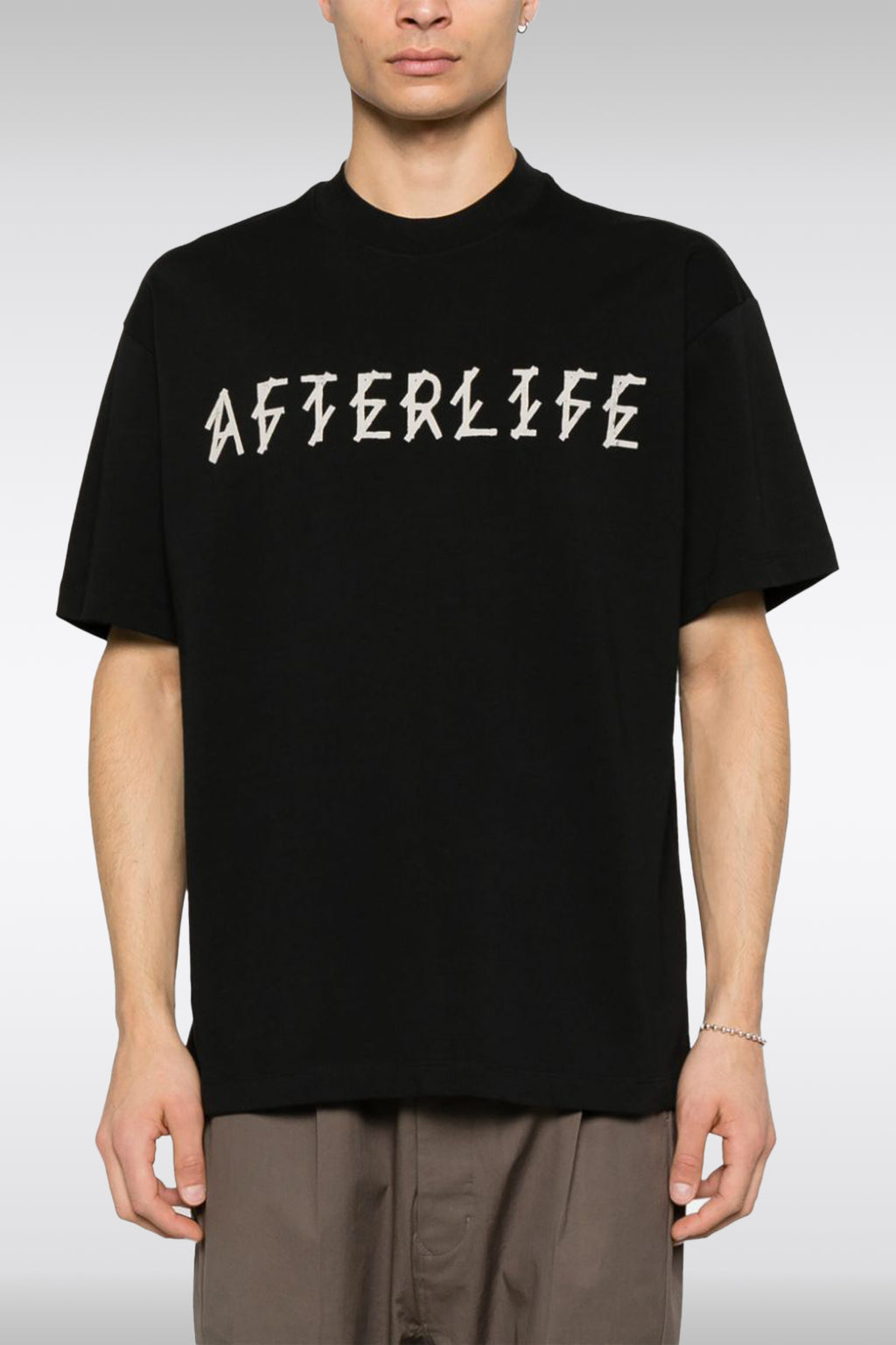 alt-image__T-shirt-nera-con-slogan-frontale-e-logo-sul-retro---Afterlife-Tee