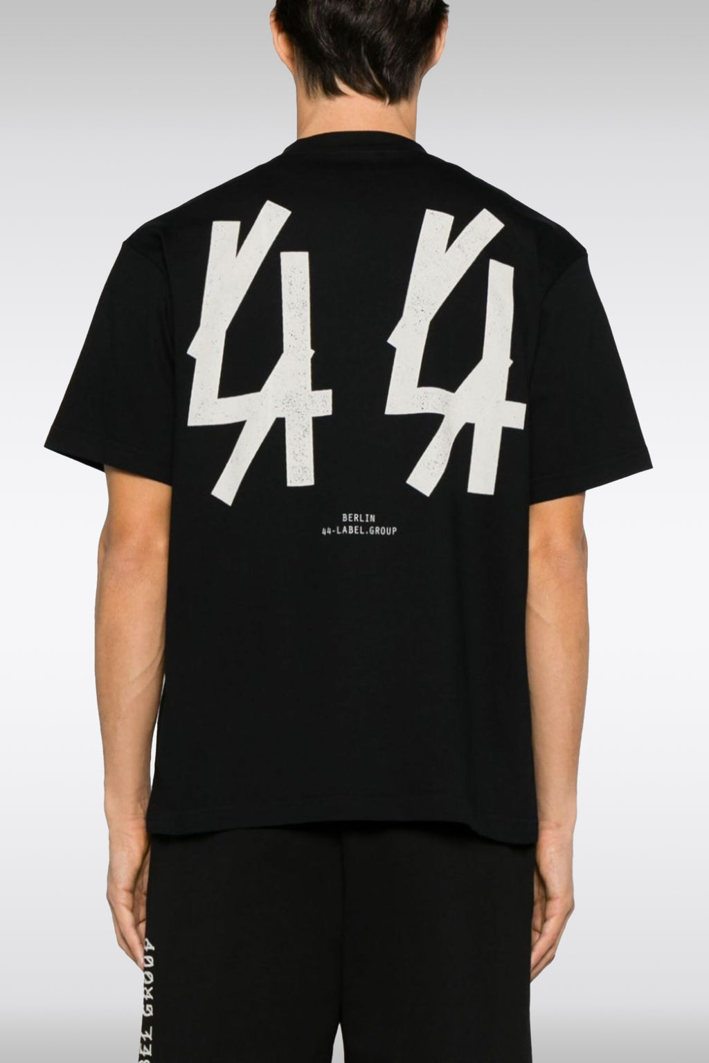 alt-image__Black-cotton-t-shirt-with-front-slogan-and-back-logo---Gyuestlist-Tee