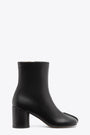 Black leather ankle boots with anatomic toe and upper stitching 