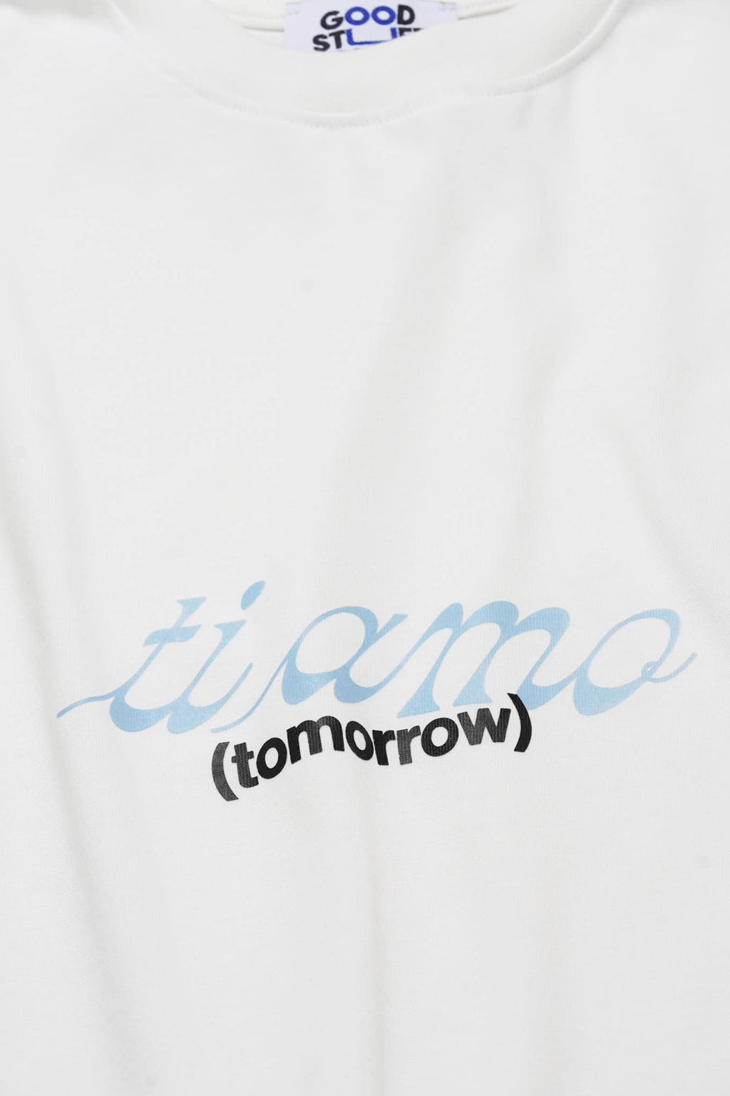 alt-image__T-shirt-bianca-con-slogan-stampato-al-petto