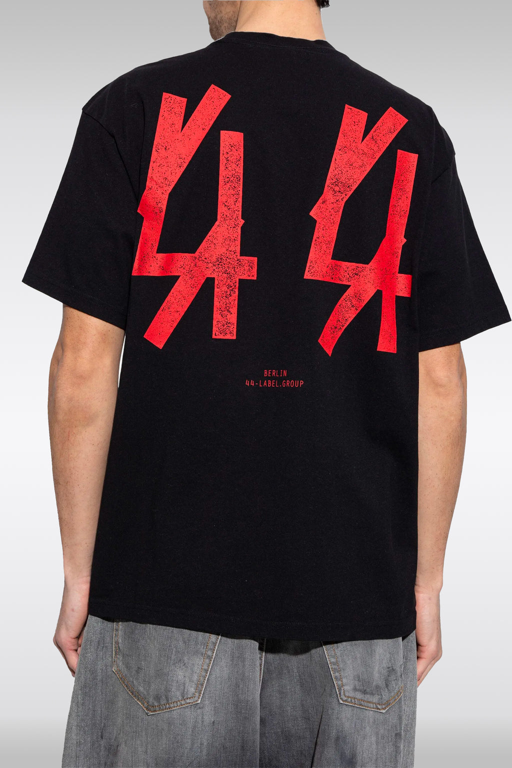 alt-image__Black-cotton-t-shirt-with-red-print-